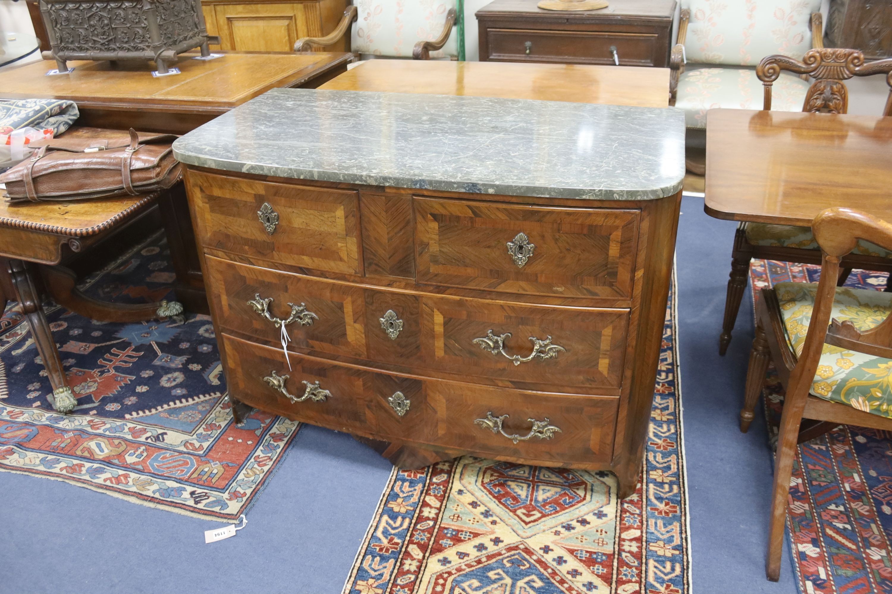 An 18th century French banded walnut marble topped bow front commode, width 112cm, depth 59cm, height 81cm
